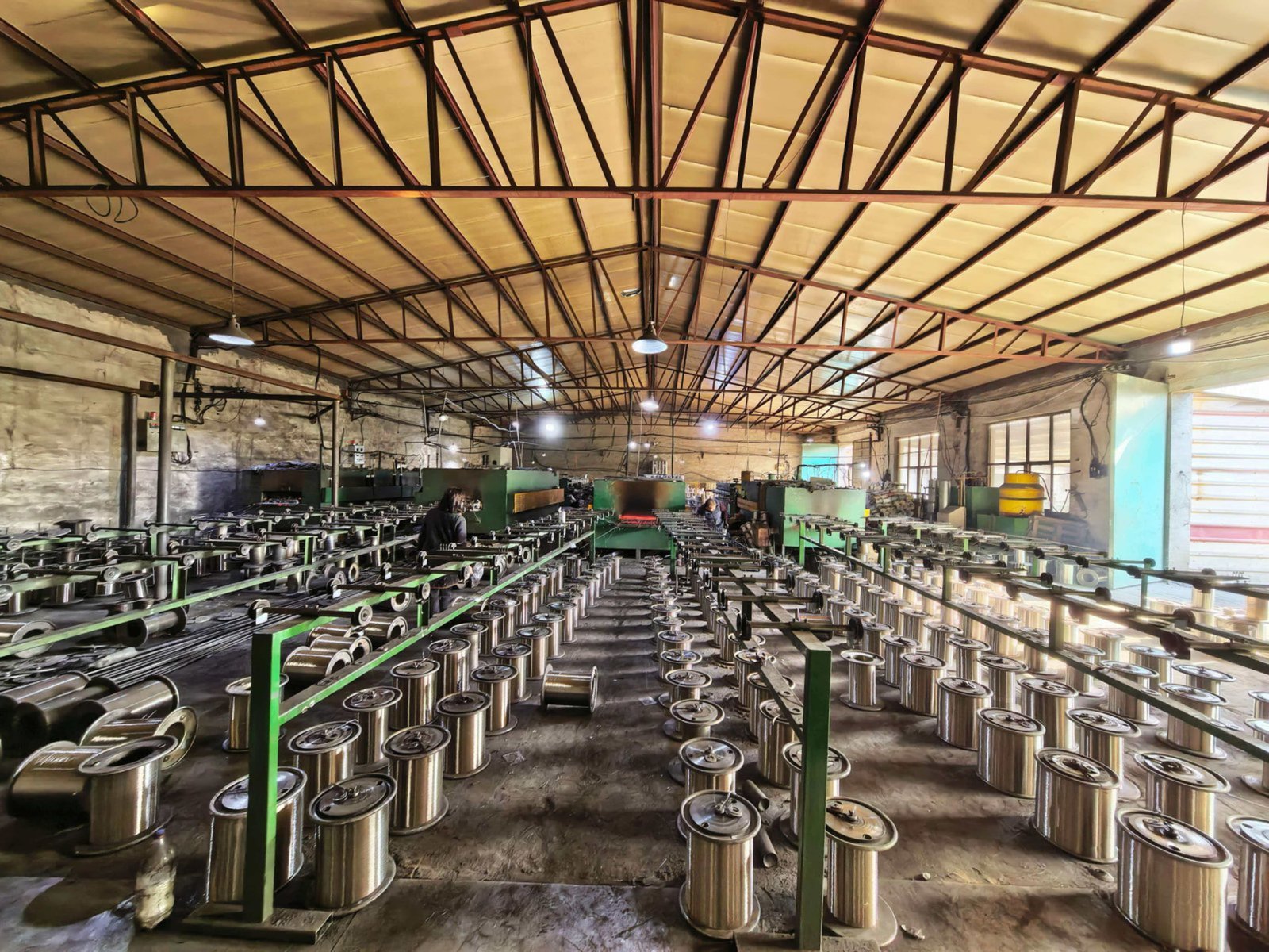 XF Wire Mesh factory aerial view showing integrated wire drawing and mesh weaving production lines in Anping, China