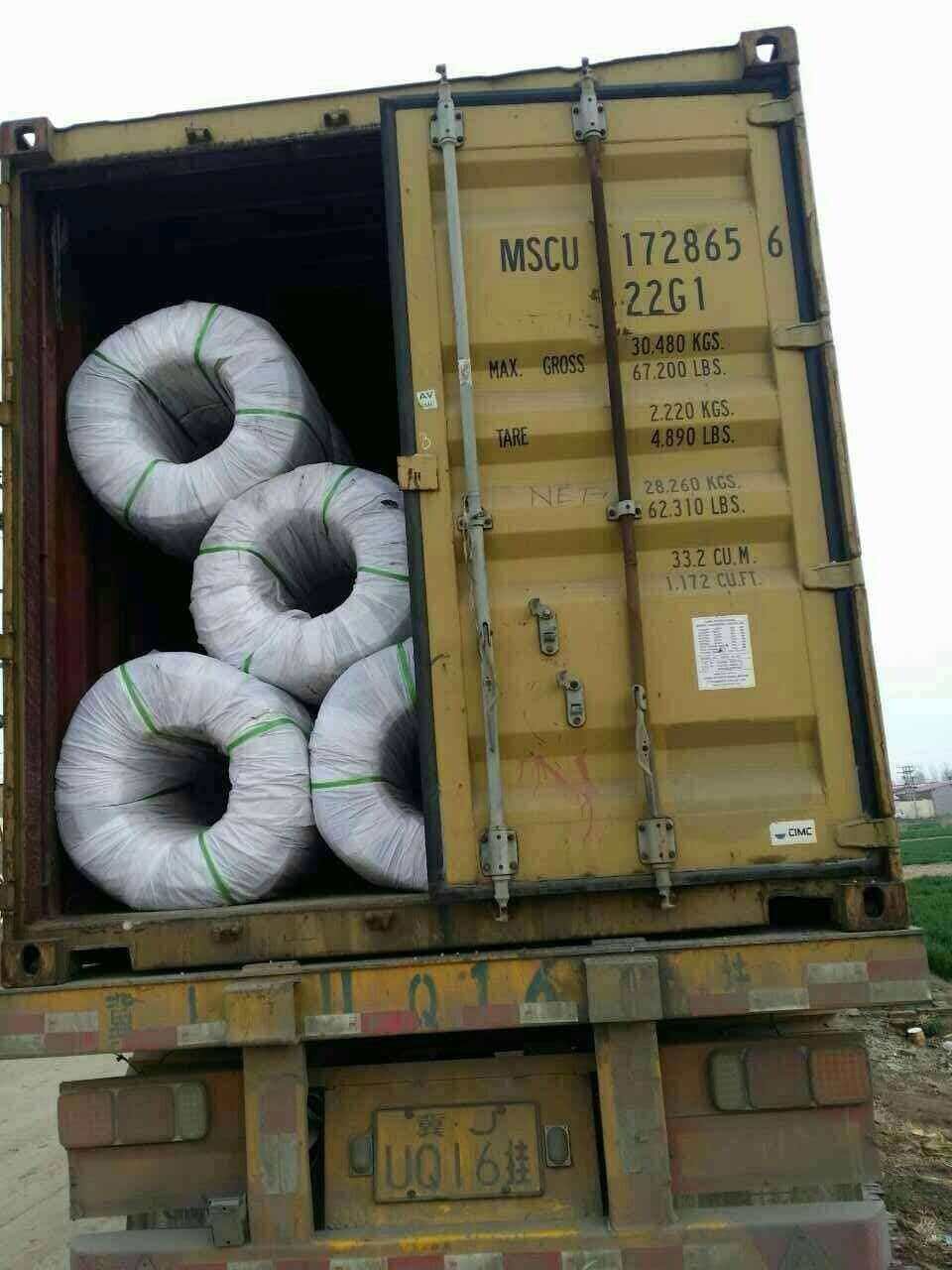 Large coils of 201 stainless steel wire ready for a construction project