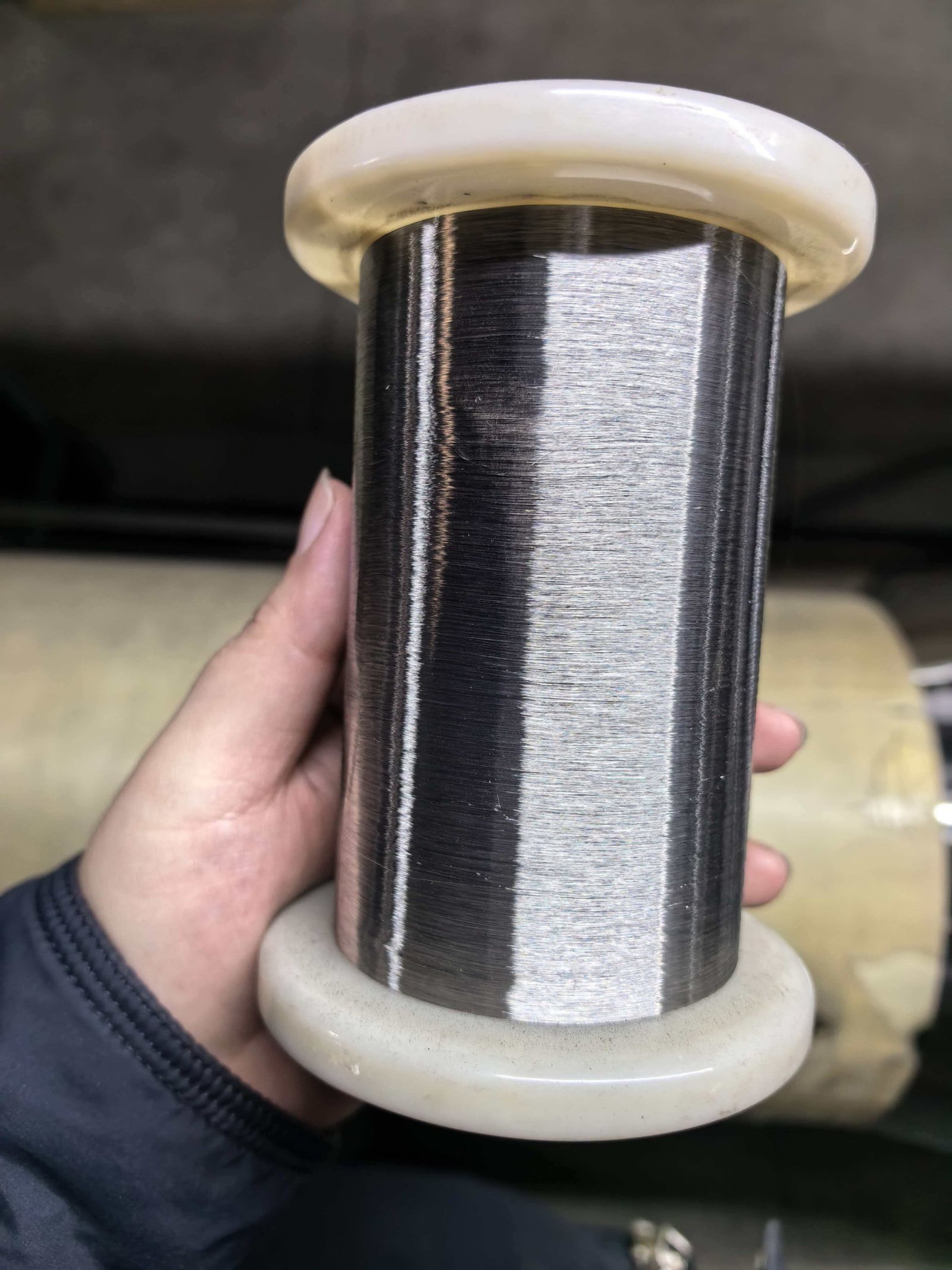 Reviewing Steel Wire Specifications A construction manager reviewing technical specification documents for steel wire.