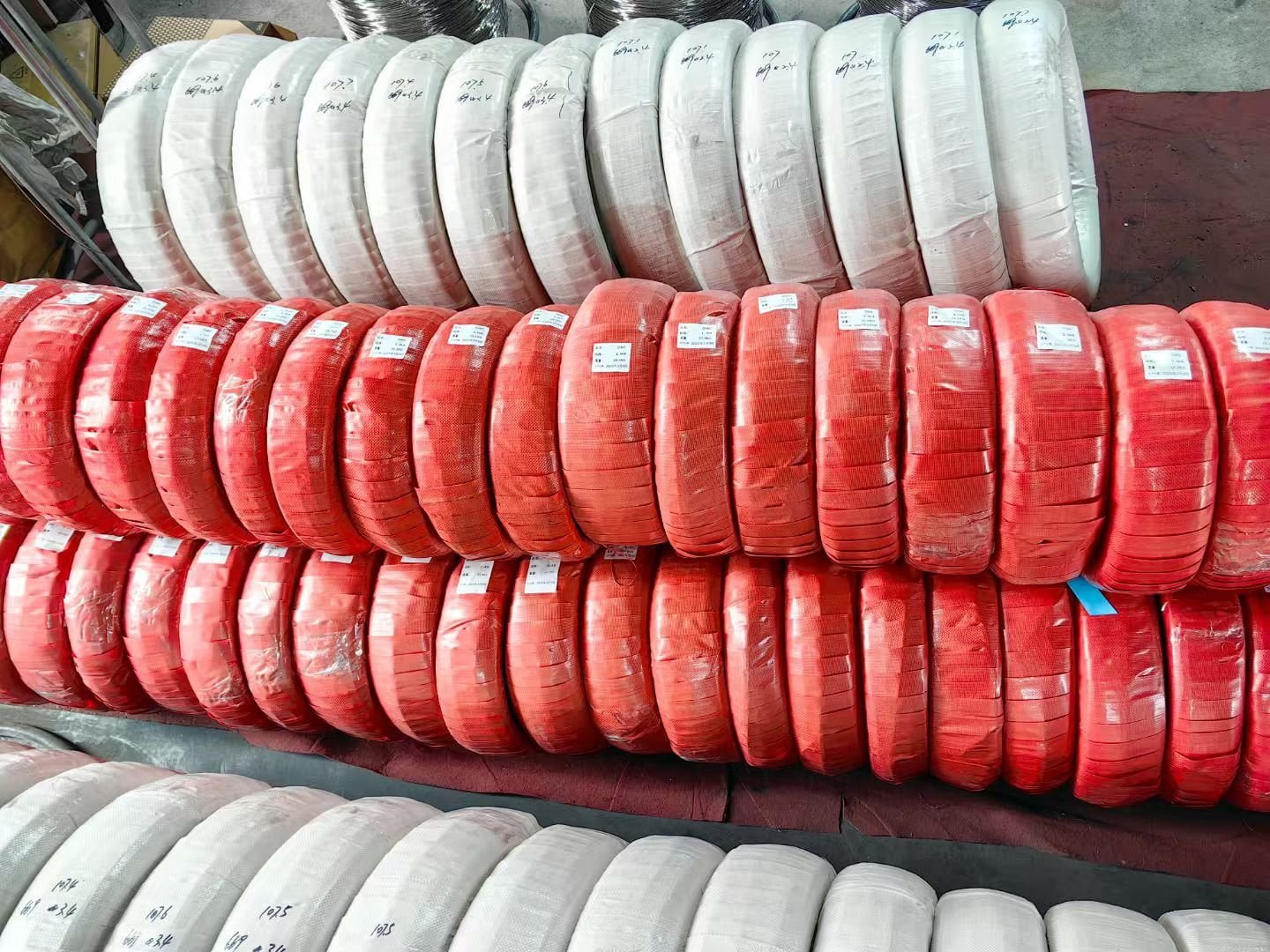 A securely packaged pallet of stainless steel wire ready for shipping