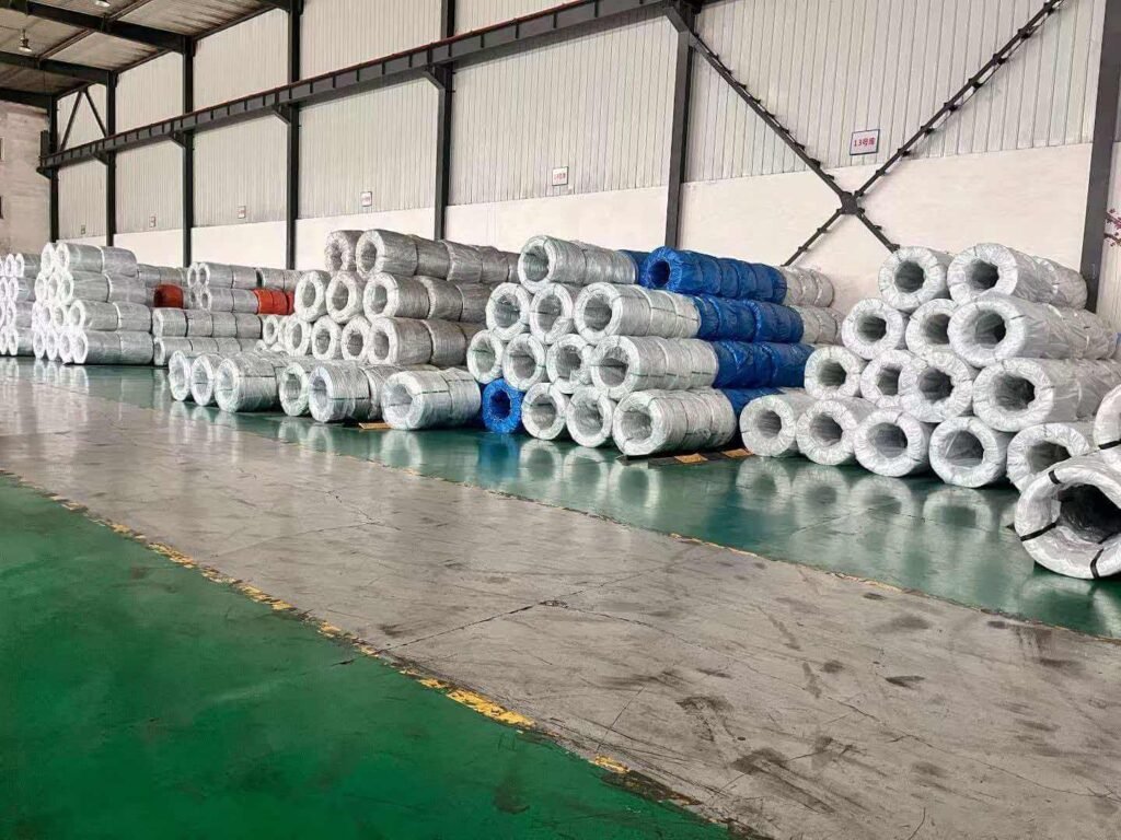 galvanized iron wire warehouse inventory palletized coils ready to load for export to African markets